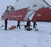 Ice crew and ice work next to the USCGC Healy.  Photo by J.Malczyk